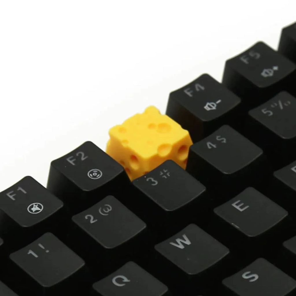 Yellow resin cheese wedge key cap for mechanical keyboards with Cherry MX compatibility