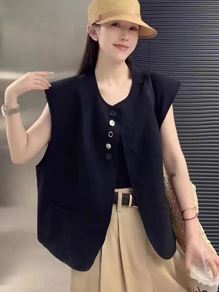 Women's loose fit polyester vest with pockets in milky white colour showing front view