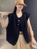 Women's loose fit polyester vest with pockets in milky white colour showing front view