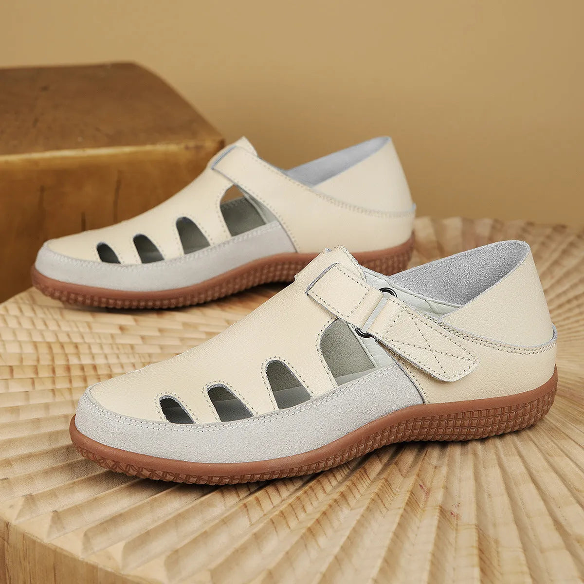 Women's plus size flat heel sandals in white with hollow PU upper and thick rubber sole