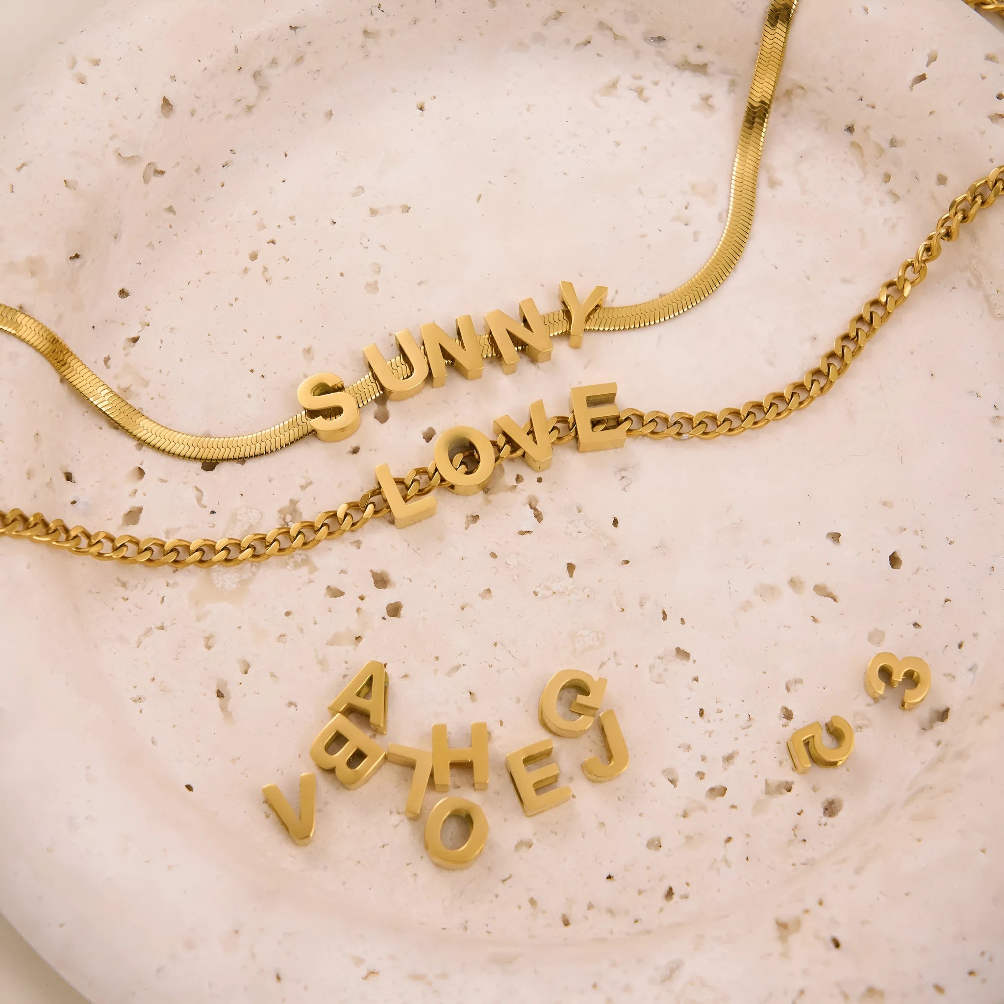 INS Commuter personalisable titanium steel necklace with number and letter pendant options in gold or silver finish