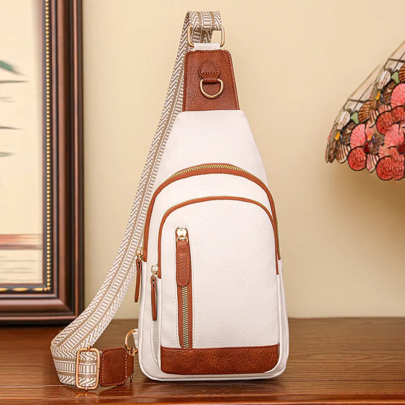 Women's small chest messenger bag in soft PU leather with open pocket and sewing thread detailing