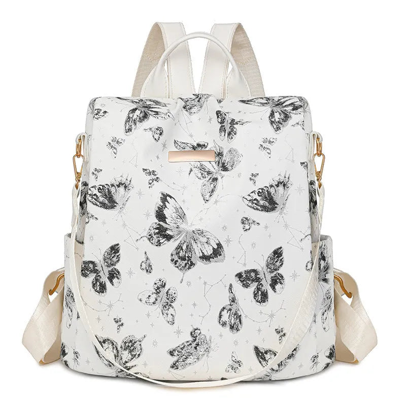 Butterfly printed PU backpack in blue with large capacity shoulder bag design and sewing line detailing