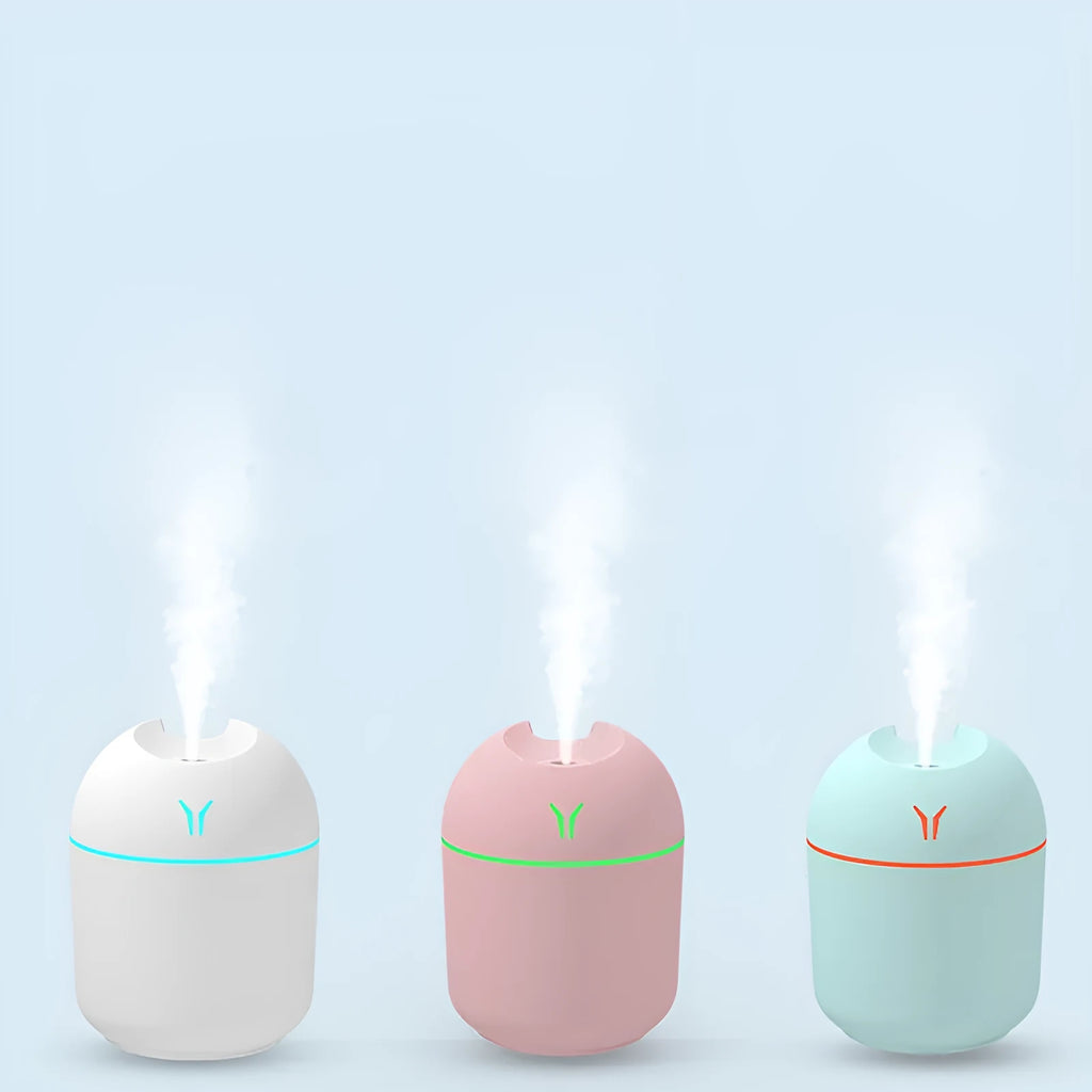 Home mini aromatherapy atomizer in ivory white, compact USB humidifier for desktop or car use