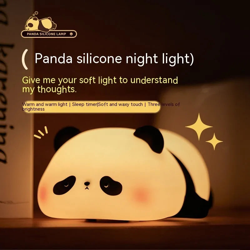 Cartoon panda head night light with silicone construction and warm white glow