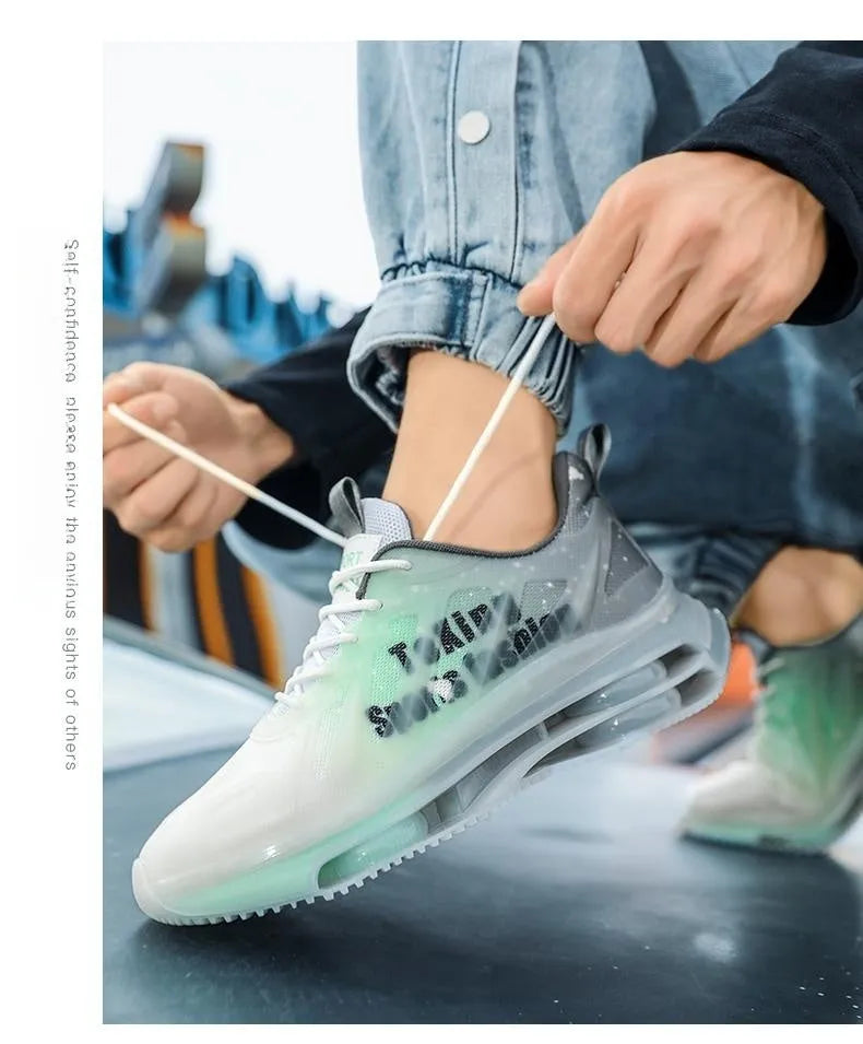 Men's black and green platform sneakers with mesh upper, rubber sole, and lace-up front.