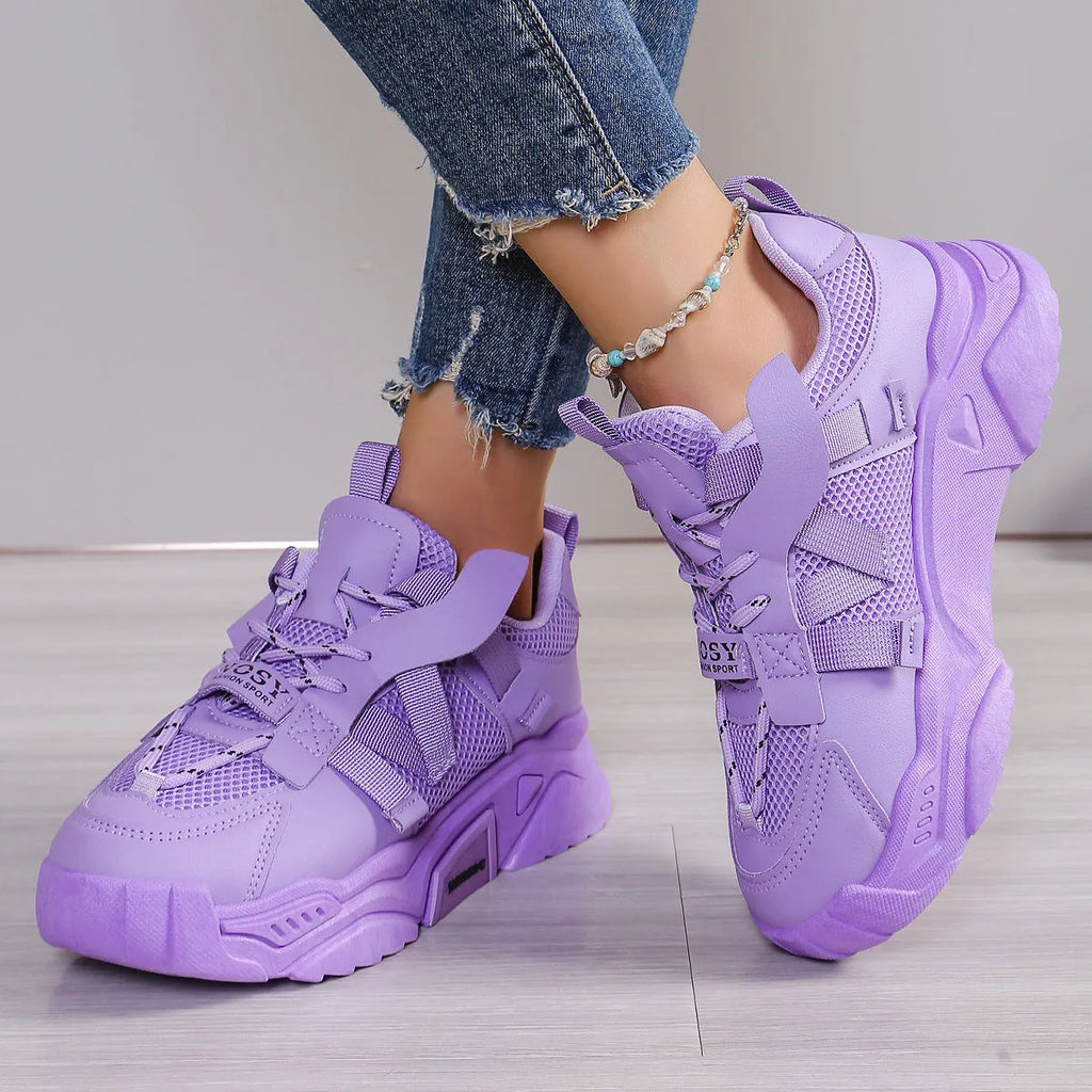 Women's purple platform mesh sports shoes with lace-up front and patterned sole