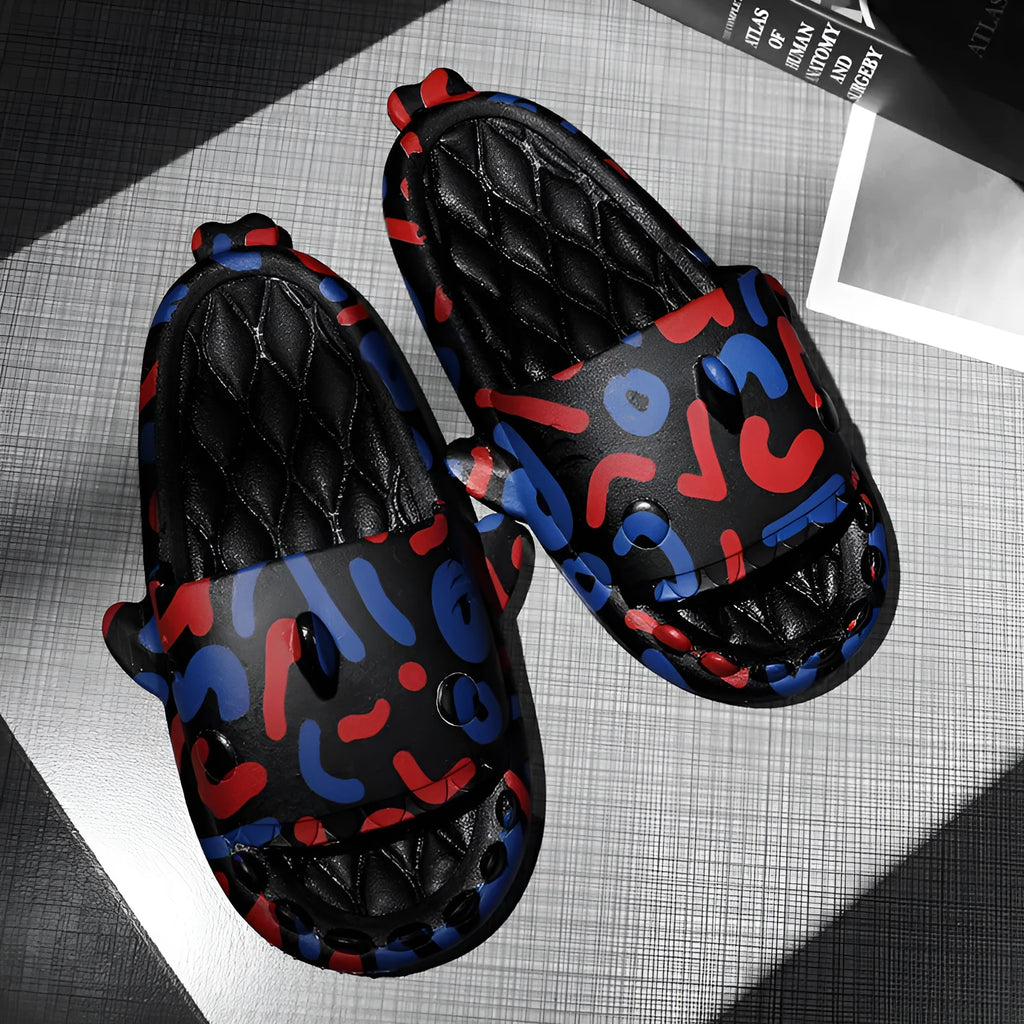 Cute shark graphic EVA open-toe home slippers for adults on a white background.