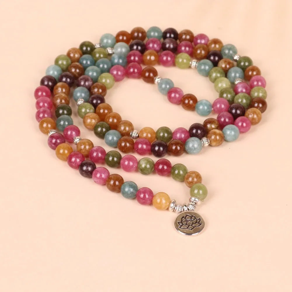 Multi-strand tourmaline bead bracelet with lotus clasp showing 108 beads on alloy chain