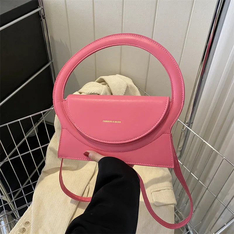Horizontal square PU leather messenger bag with stitching detail and internal phone pocket