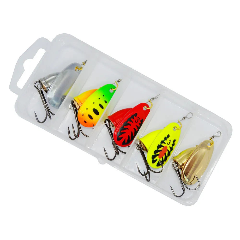 R composite rotating sequins copper bell metal fishing lure in multiple colour options on a tackle box.