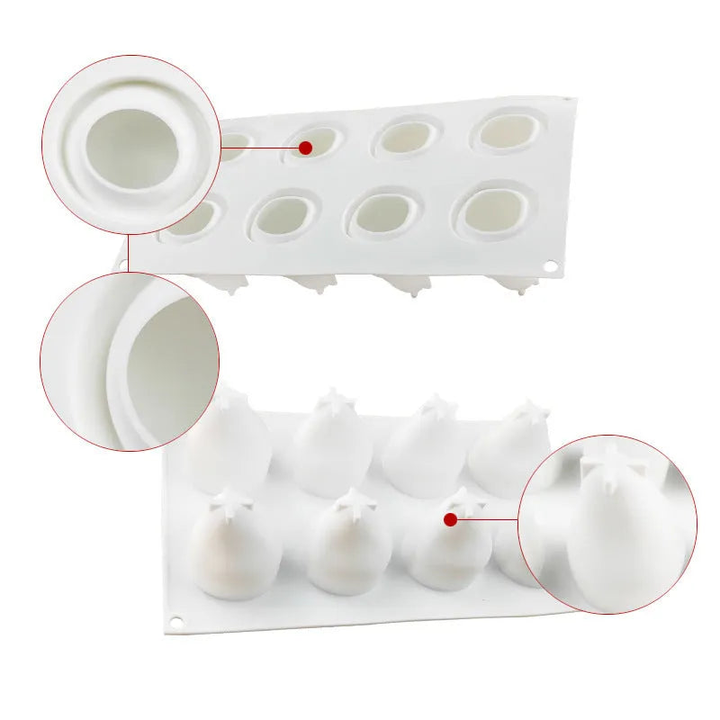 Silicone baking molds in pineapple, pear, and pine cone shapes for making mousse cakes and desserts.