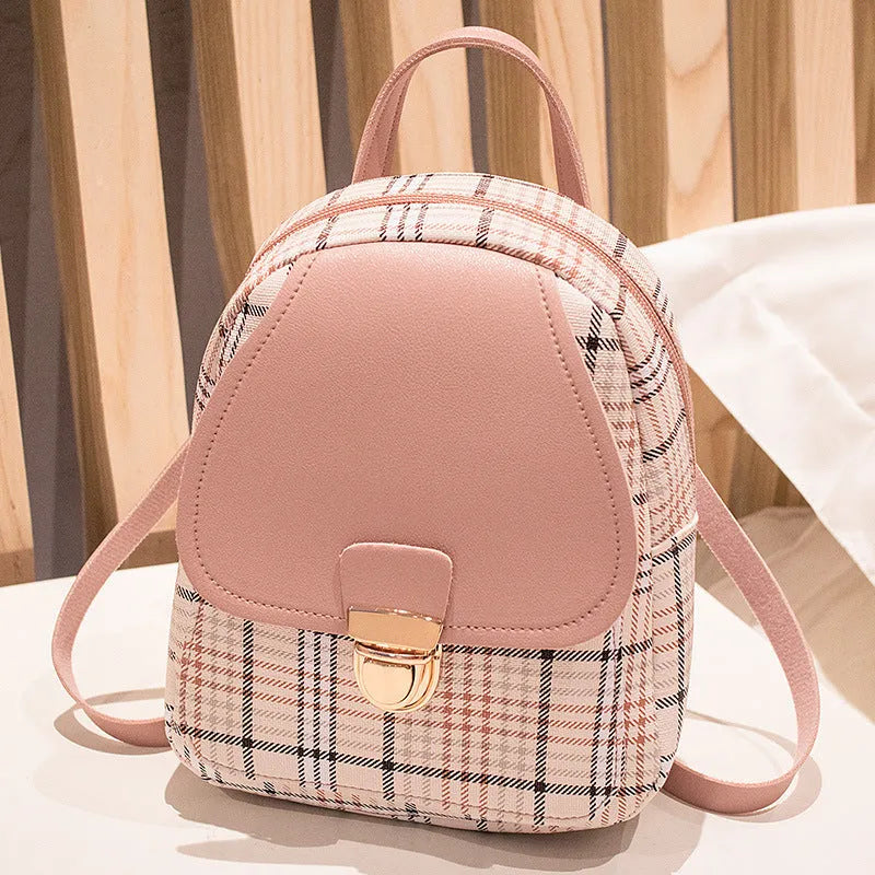 Black one shoulder diagonal PU leather phone bag worn across the body