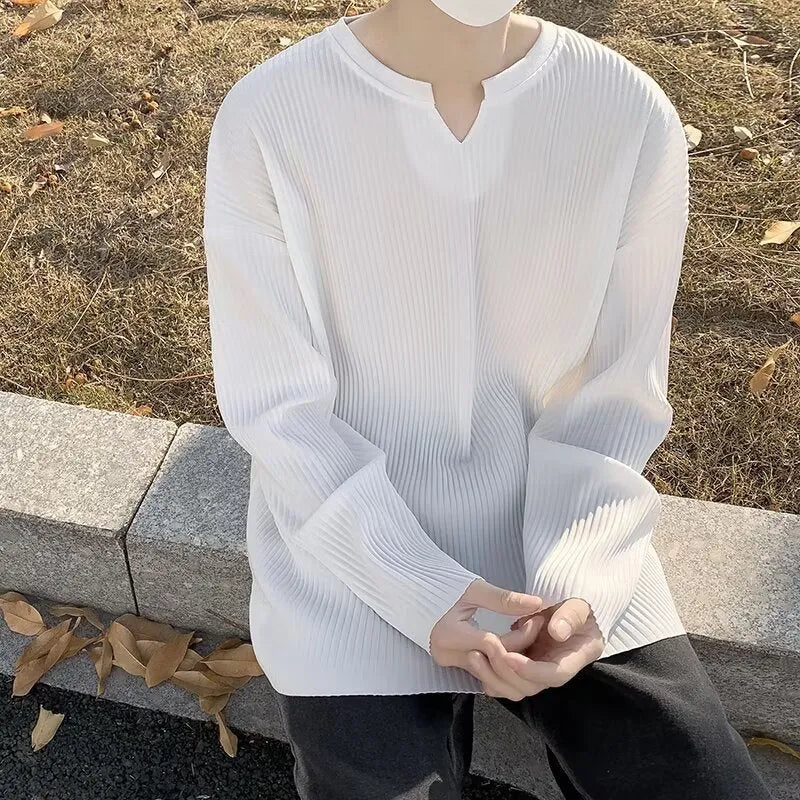 Plus size striped texture draping solid colour pullover in black, long sleeves, loose fit, front view