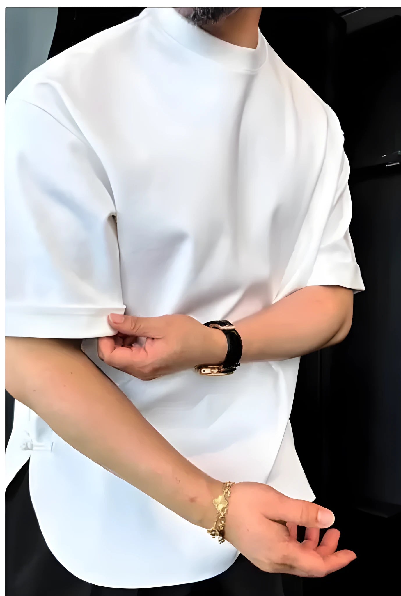 White men's cotton t-shirt with a buttoned round hem on a hanger