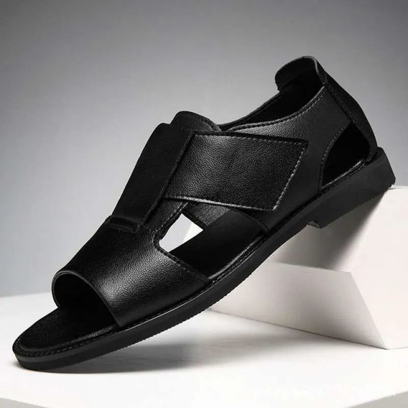 Men's black leather casual Roman sandals with an open toe and rubber sole on a neutral background.