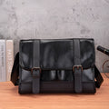 Black Korean-style men's anti-theft commuter backpack with waterproof PU material and visible sewing thread detailing