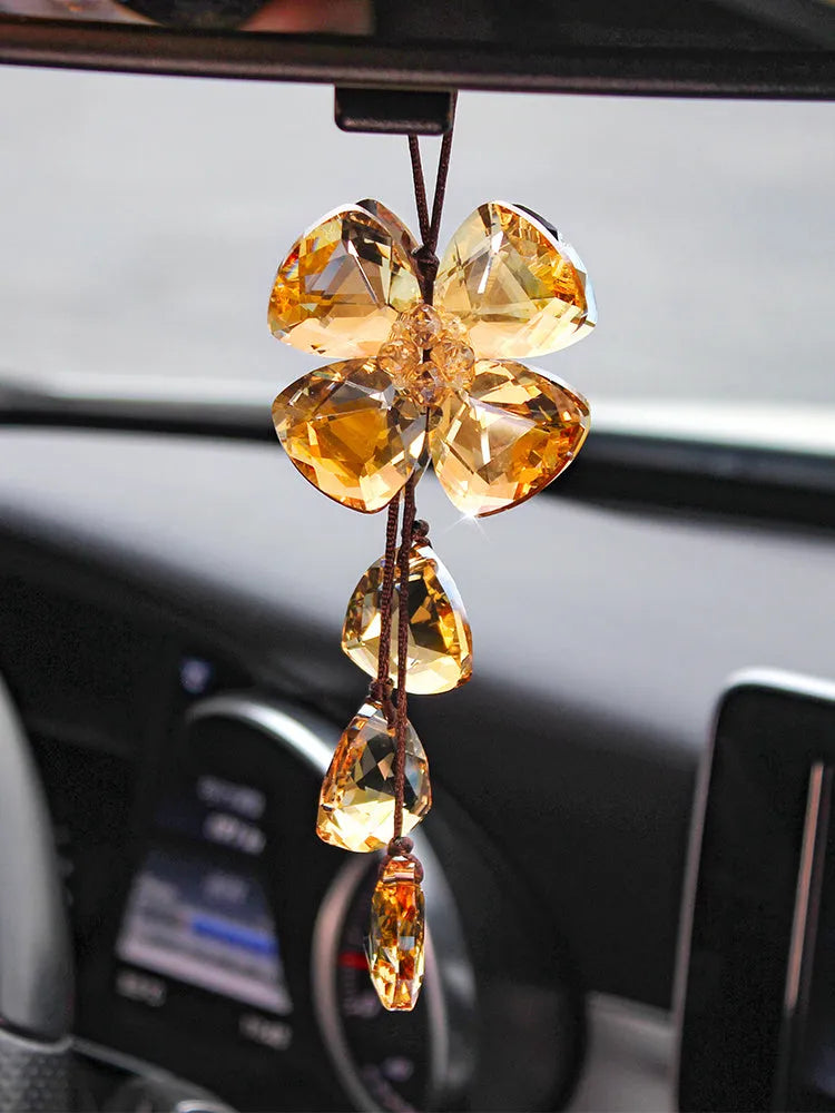 Crystal Four Leaf Grass car pendant decoration in transparent, champagne, black, and shiny finishes, approximately 20 cm long.