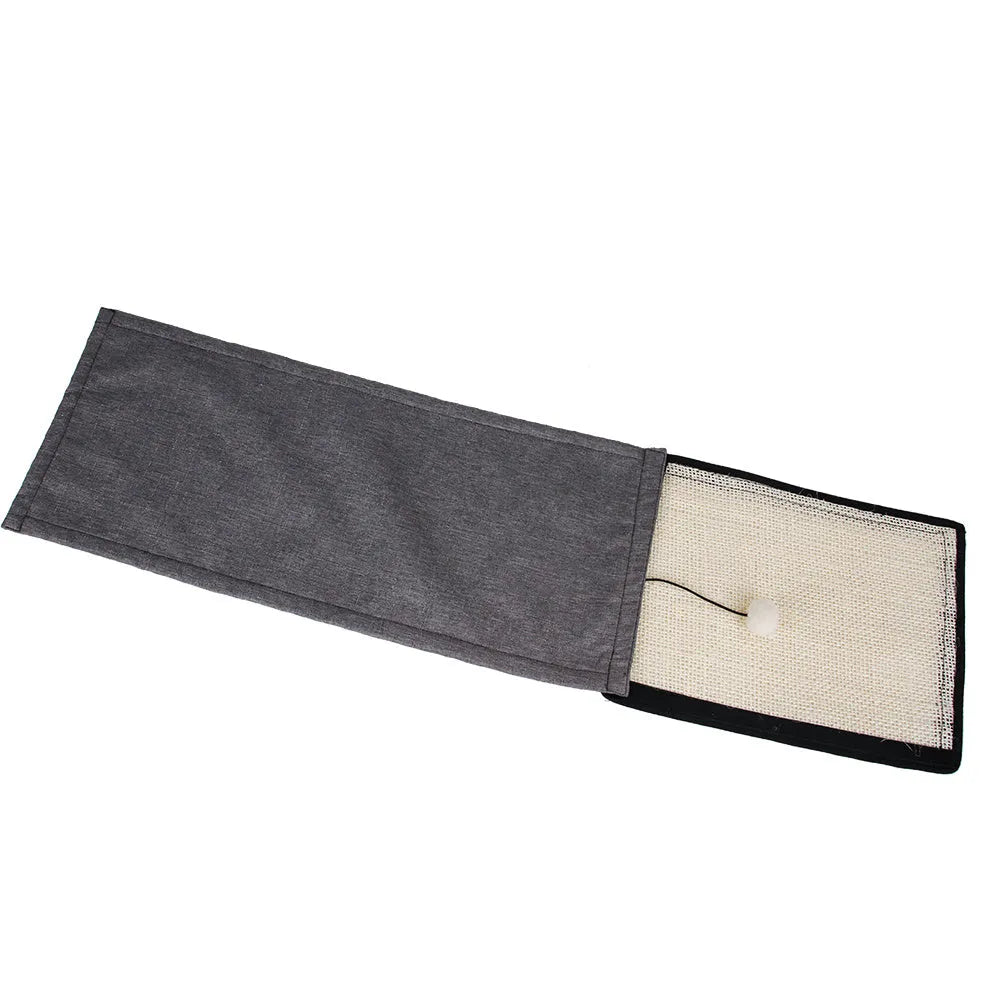 Beige cat scratch board sisal pad 40x29cm on a sofa armrest for furniture protection