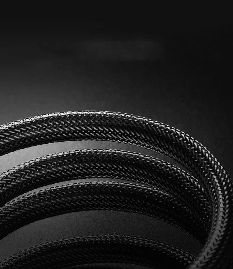 A 5-metre long black HDMI cable with gold-plated connectors, coiled on a white background.