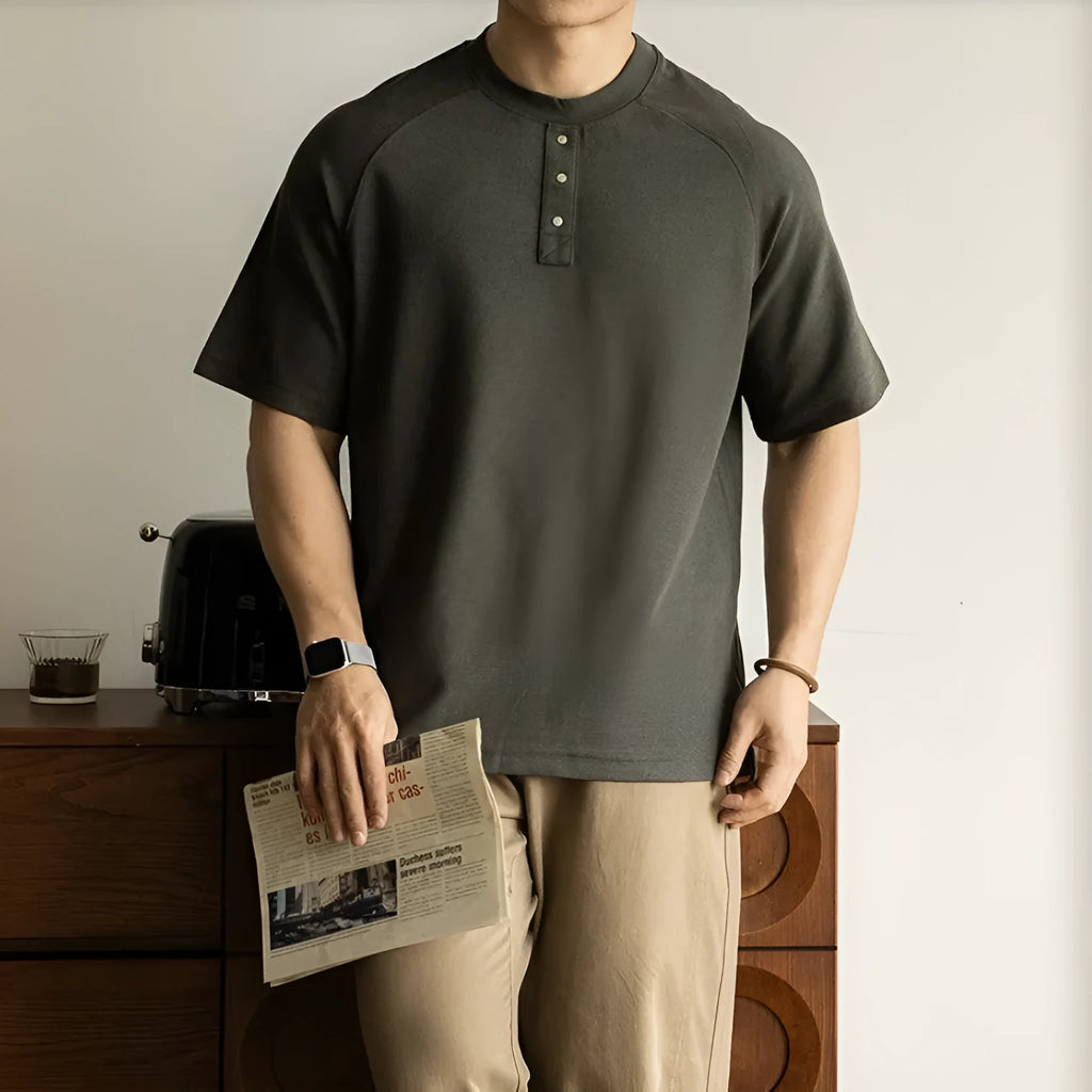 Men's smoky gray casual pullover top with raglan sleeves and a textured fabric.