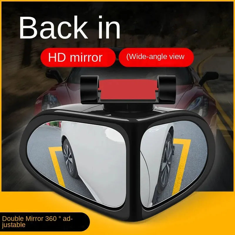 Car reversing small round wide-angle auxiliary mirror with adjustable ball joint, black, on a silver car side mirror