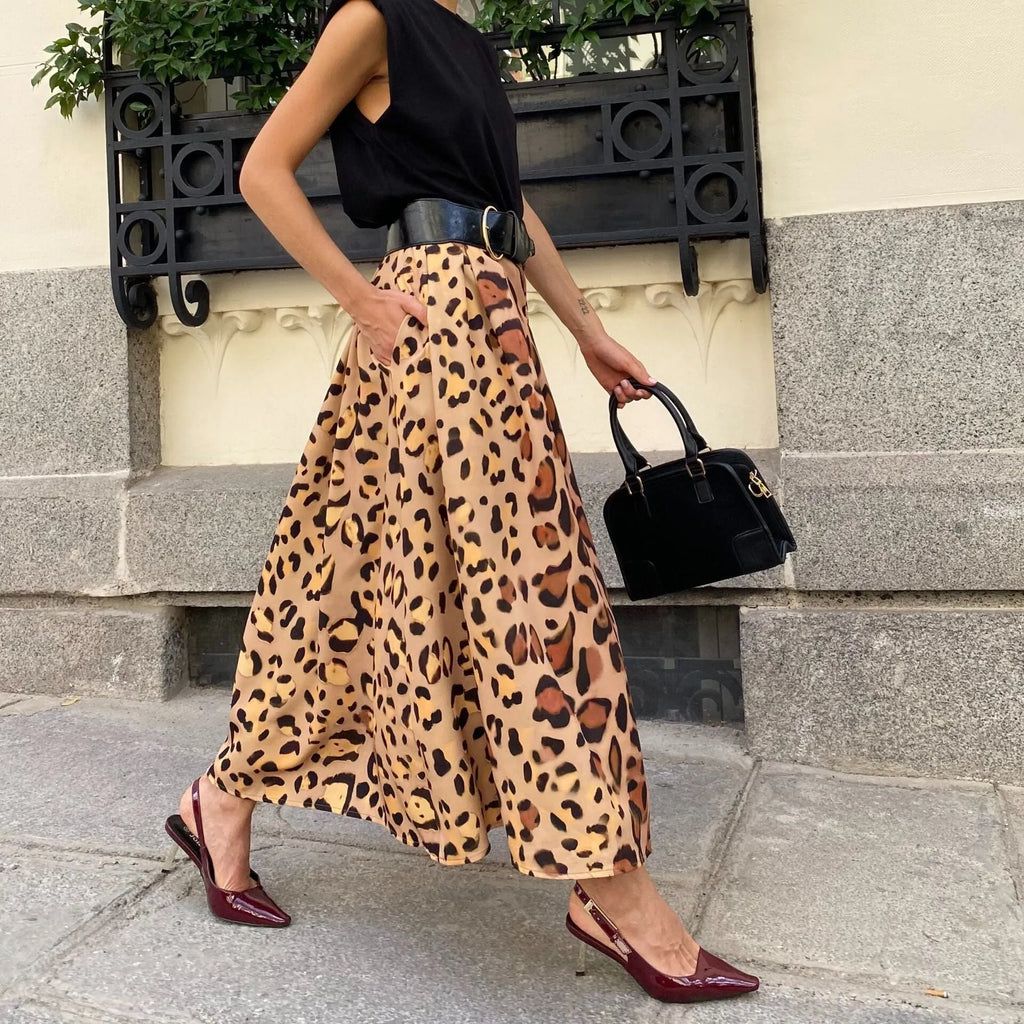 Women's brown leopard print A-line long skirt with big hem design on hanger