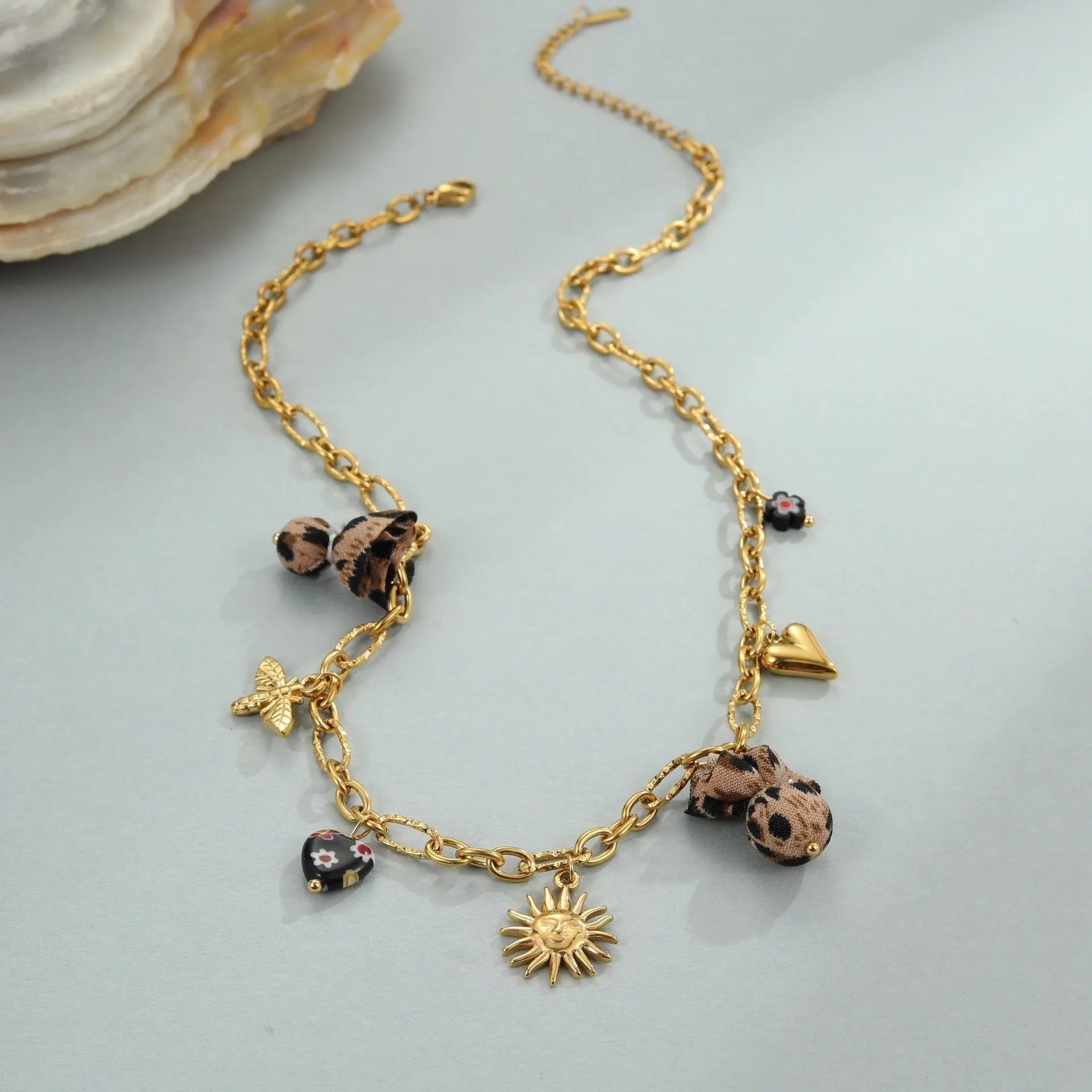 Stainless steel necklace with leopard, love hearts and flowers pendant on adjustable chain