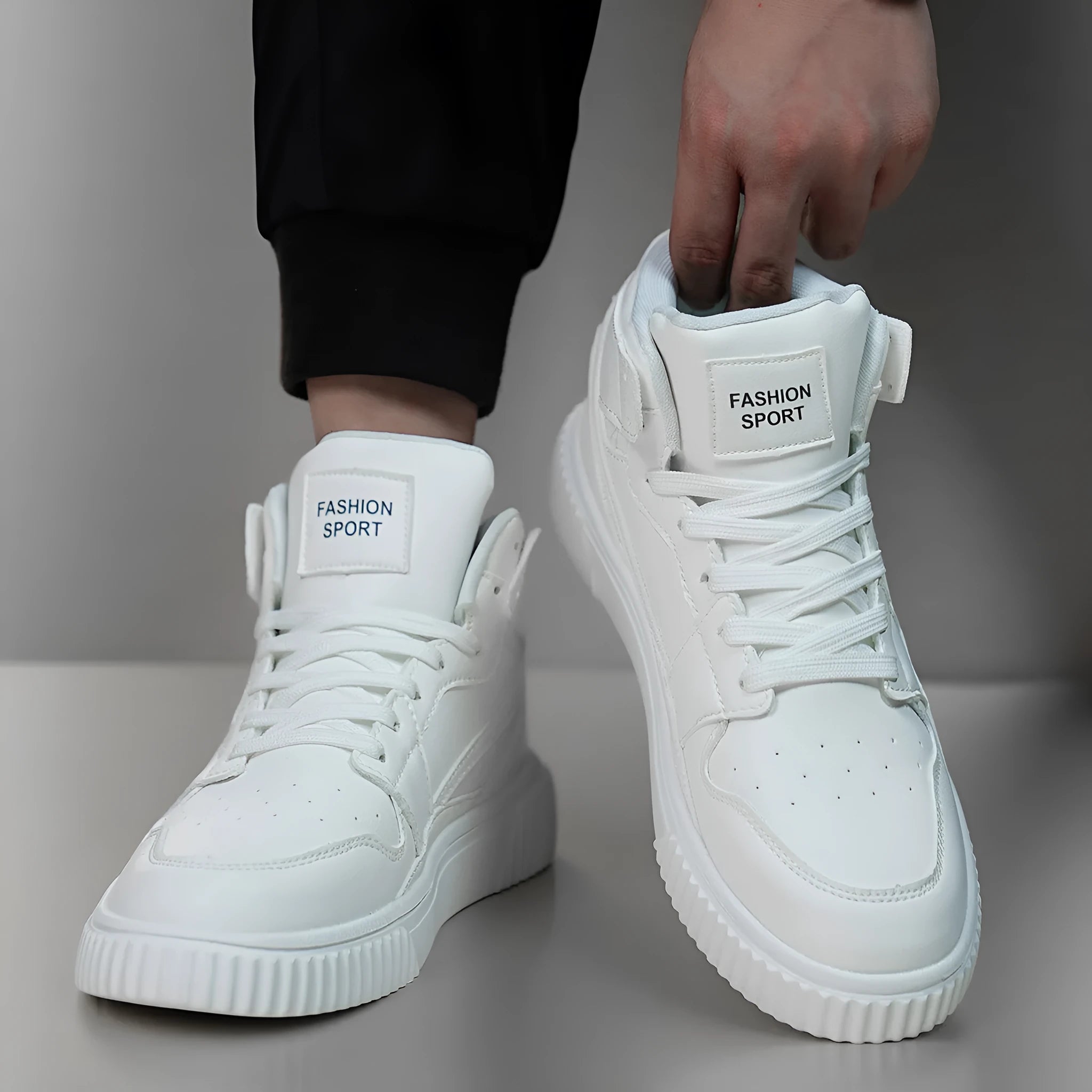 Men's solid white round toe casual shoes with a microfiber leather upper on a neutral background.
