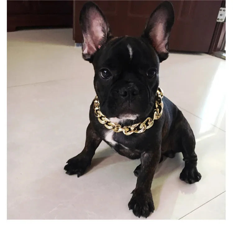 Geometric dog collar ornament with twisted chain buckle in gold, rose gold, and white colours.