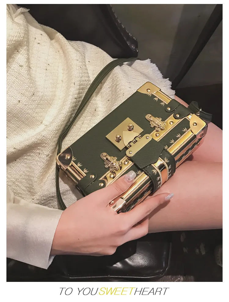 Women's hard PU shoulder bag with flap closure and rivet decoration in black or green