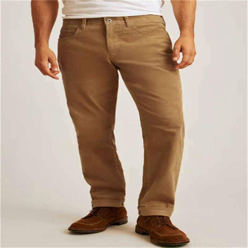 Men's loose fit straight leg corduroy trousers in Army Green colour.