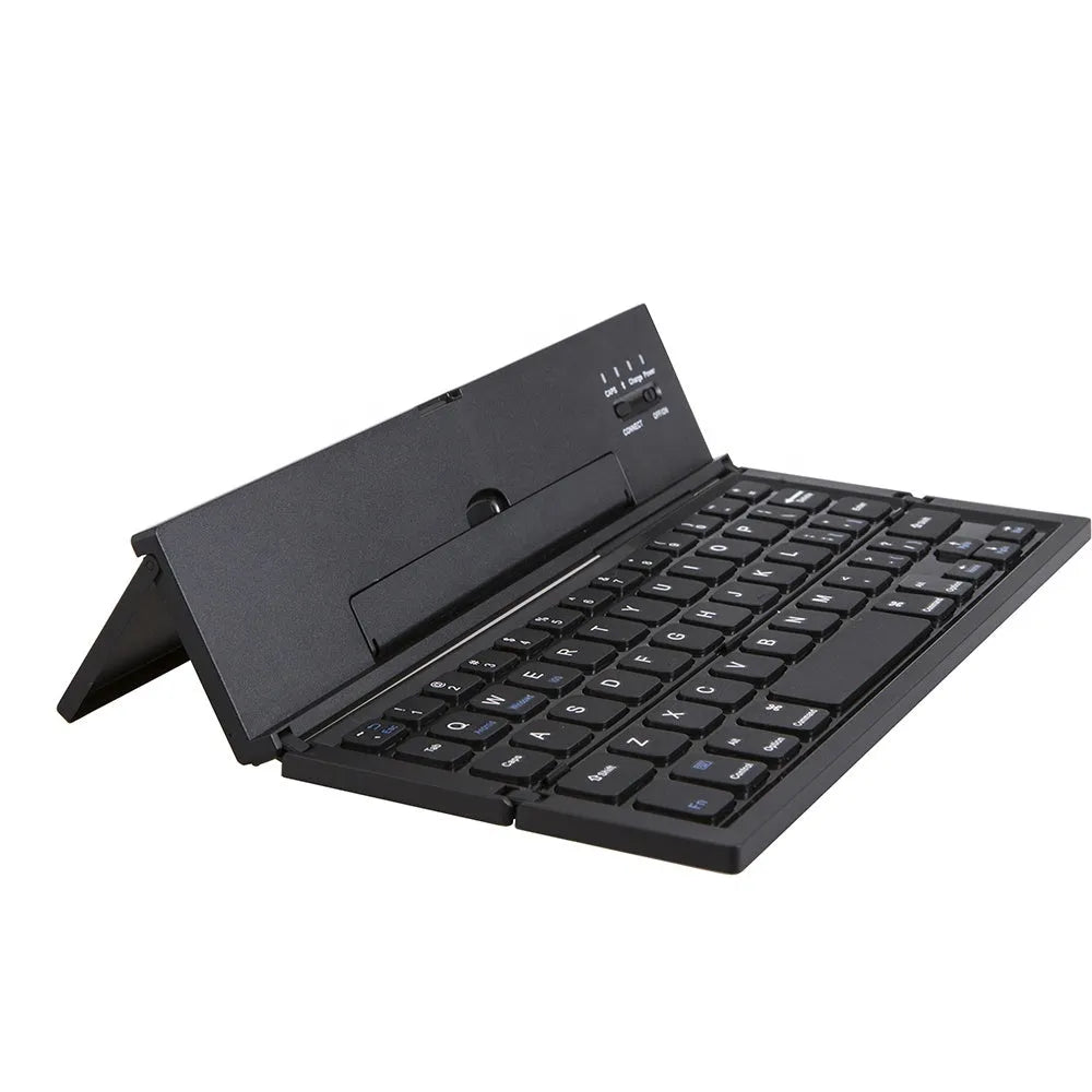 Black and white views of a folded mini wireless Bluetooth keyboard for tablets next to a smartphone.