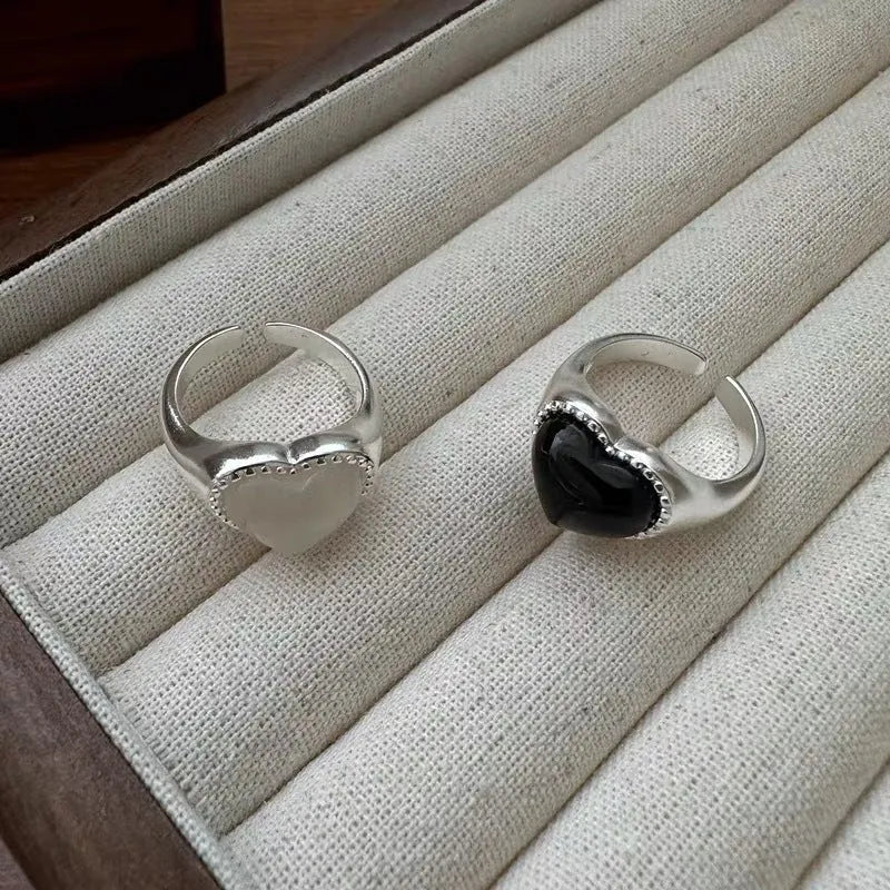 S925 sterling silver adjustable ring with black agate heart stone on finger