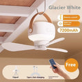 Small rechargeable electric fan for camping tent with night light on, hanging from a strap
