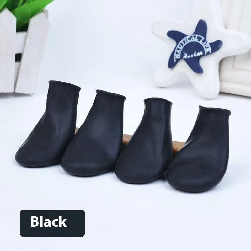 Black rubber foot strap waterproof pet boot for dogs with non-slip sole on white background