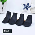 Black rubber foot strap waterproof pet boot for dogs with non-slip sole on white background