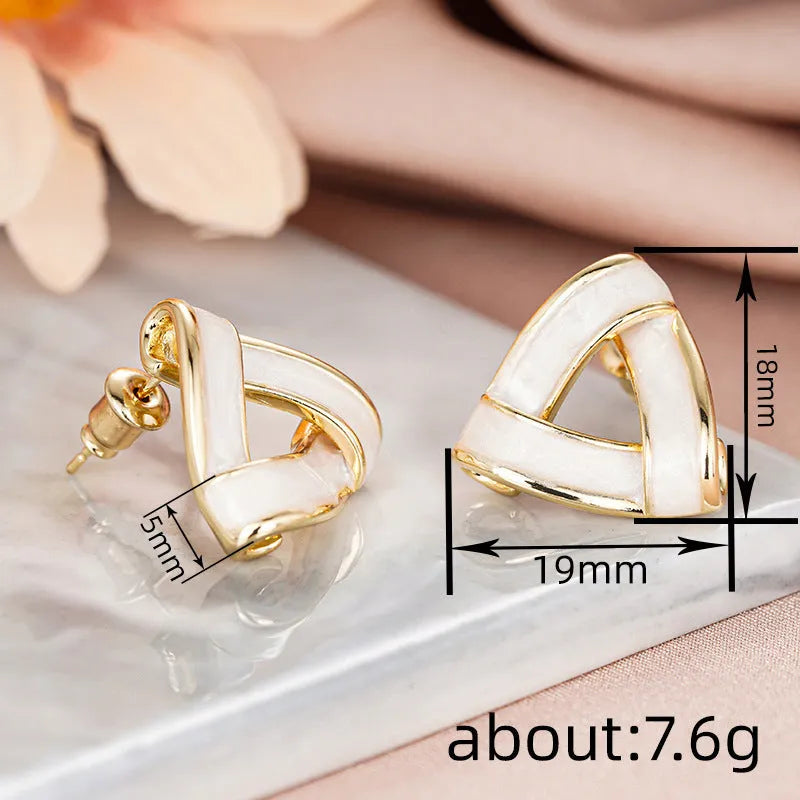 Women's yellow gold geometric triangle stud earrings with inlaid zircon on copper base