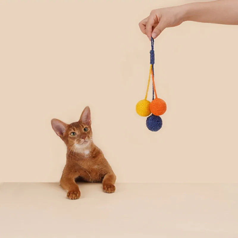 Cat toy set with teaser stick and catnip balls in blue, green, and red yellow blue colours