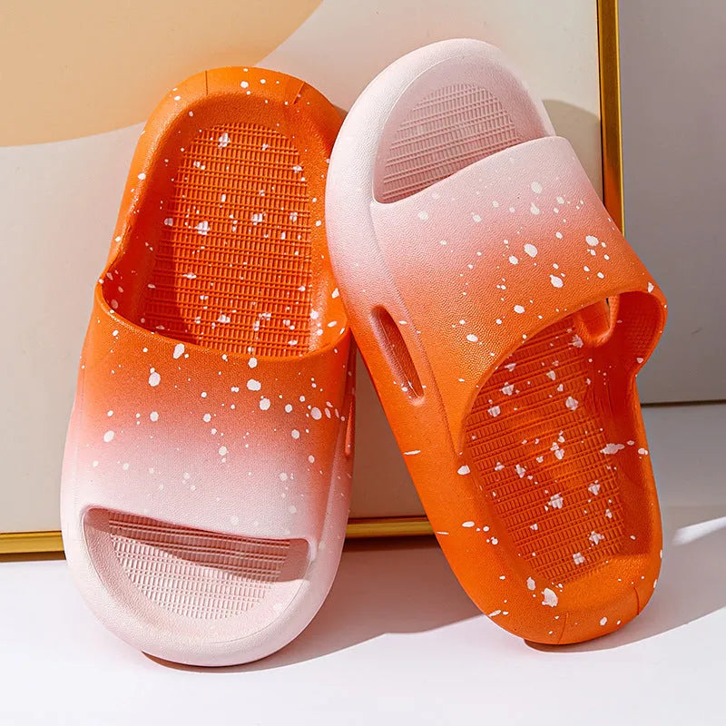 Gradient blue PVC slippers for children on a white background.