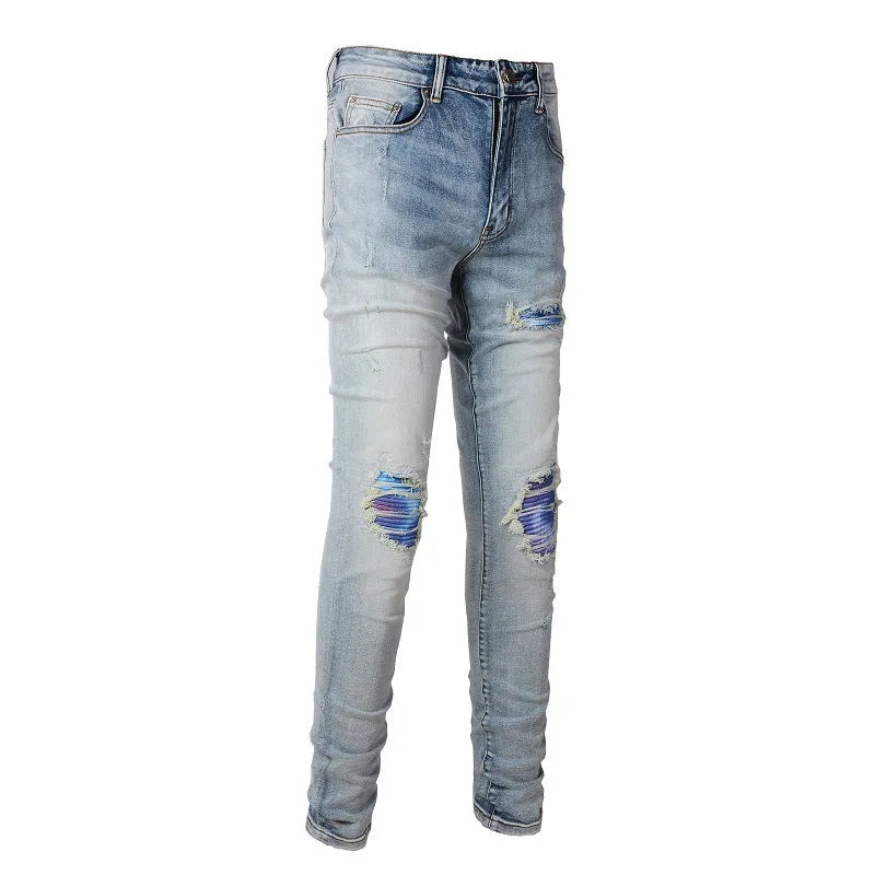 Bright white washed distressed cat beard patch ripped slim straight leg mid waist jeans cotton denim