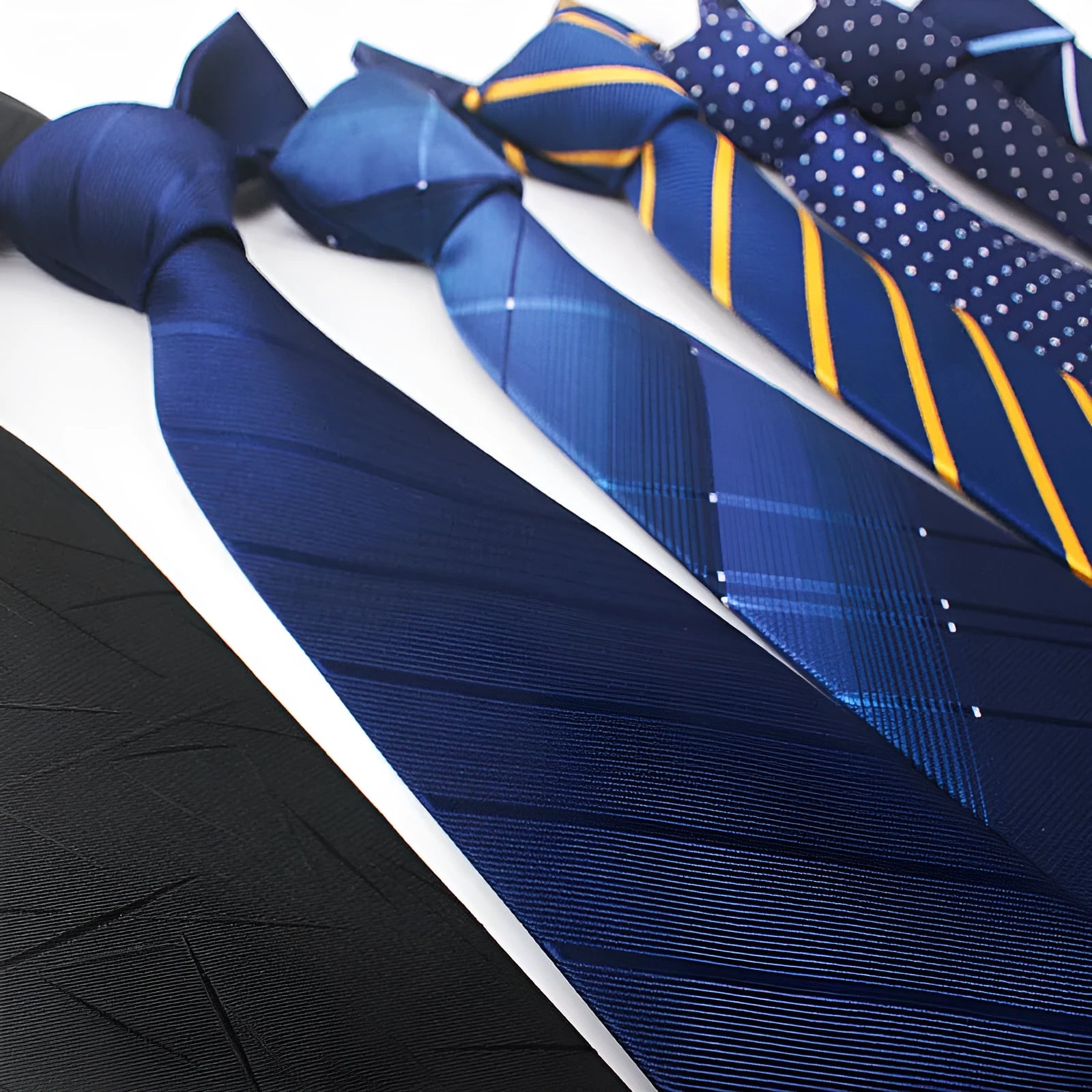 Men's polyester jacquard striped tie in red, black, and blue colour options with arrow shape
