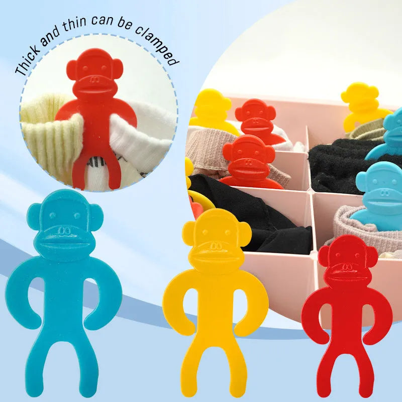 Plastic socks clips in blue, red, and yellow colours for machine wash anti-winding organisation