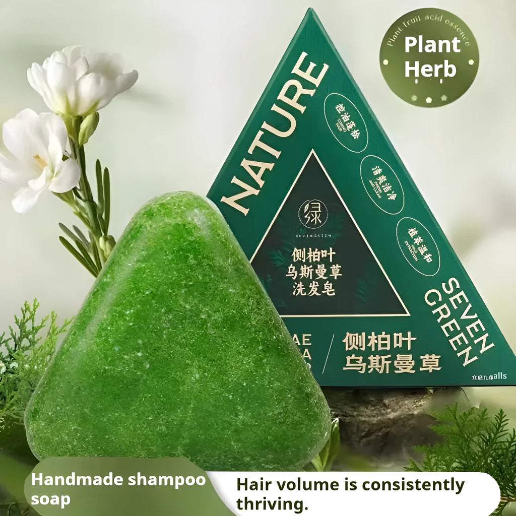 Xinjiang Wusi cypress leaf shampoo soap green solid bar on wooden surface with leaves