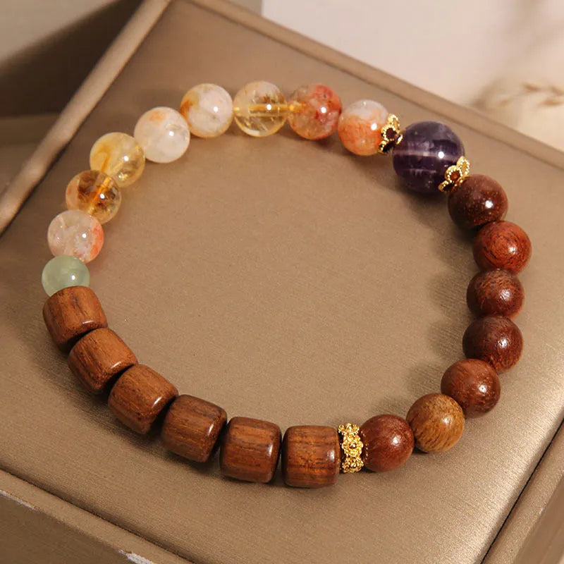 Women's crystal bracelet in yellow tower crystal, ebony, amethyst with pearl and sequin accents