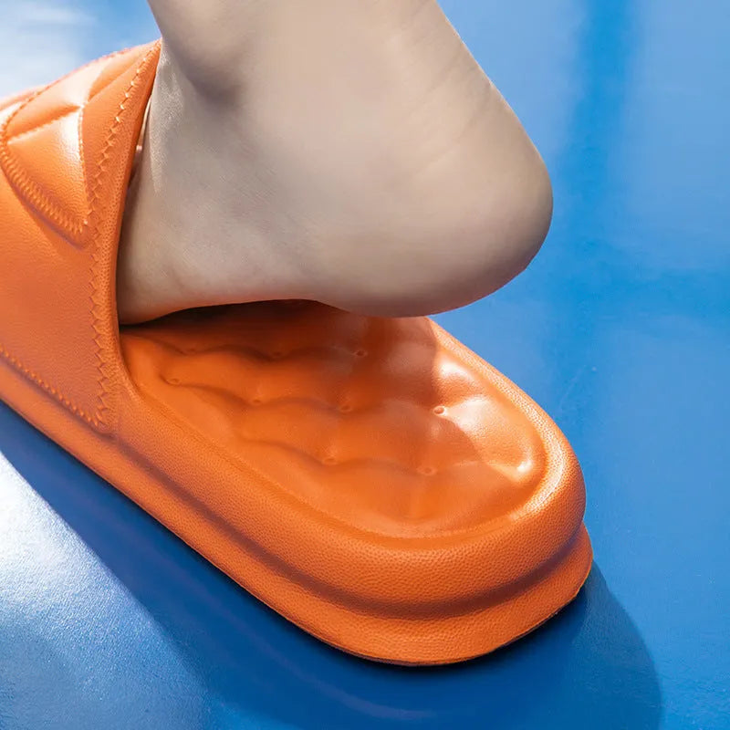 Pair of EVA bathroom slippers with thick non-slip sole shown in colour options.