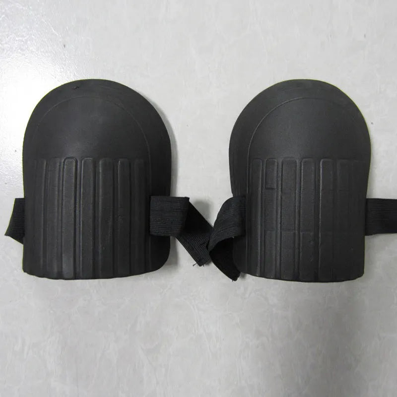 A pair of black EVA foam knee pads for gardening, measuring 19cm by 15cm.