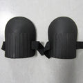 A pair of black EVA foam knee pads for gardening, measuring 19cm by 15cm.