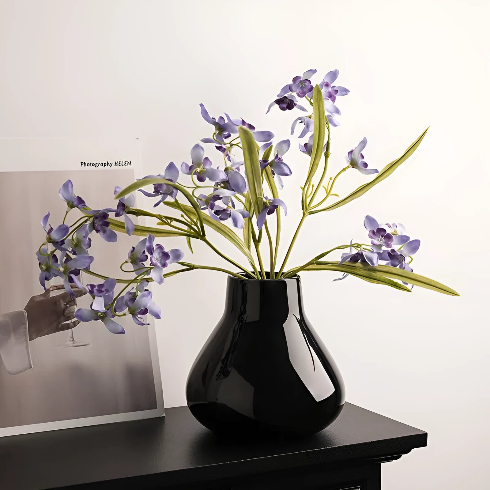 Ceramic decorative vase set with artificial orchid flowers in black or white coloured glaze finish