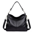 Genuine leather vertical square crossbody bag showing multiple internal pockets including a zipper changing bag and mobile phone pocket.
